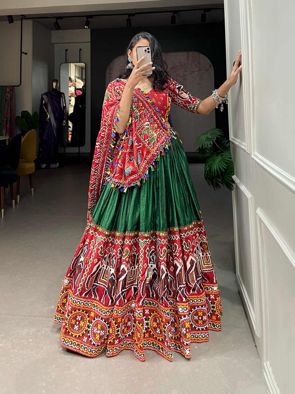 Green Color Patola Print With Gamthi Work And Mirror Work Dola Silk Chaniya Choli ClothsVilla.com
