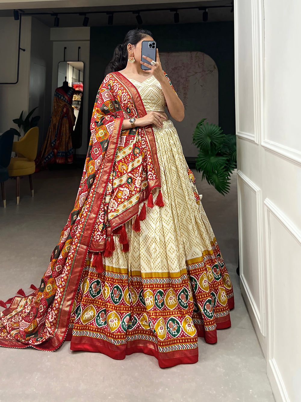 Off White Color Bandhej And Patola Print With Foil Work Tussar Silk Lehnga Choli Clothsvilla
