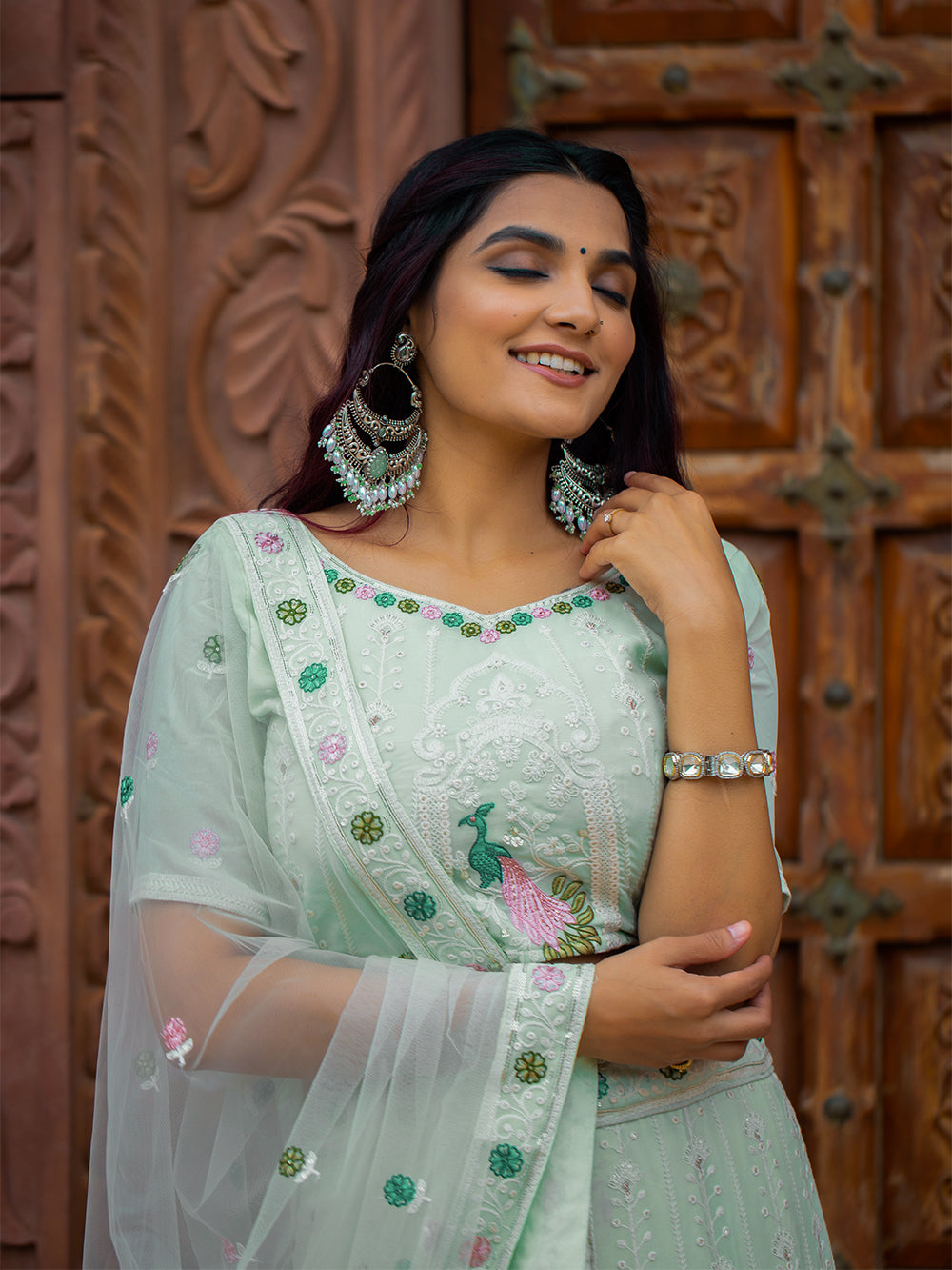 Pista Color Lucknowi Work Georgette Lehenga Choli Clothsvilla