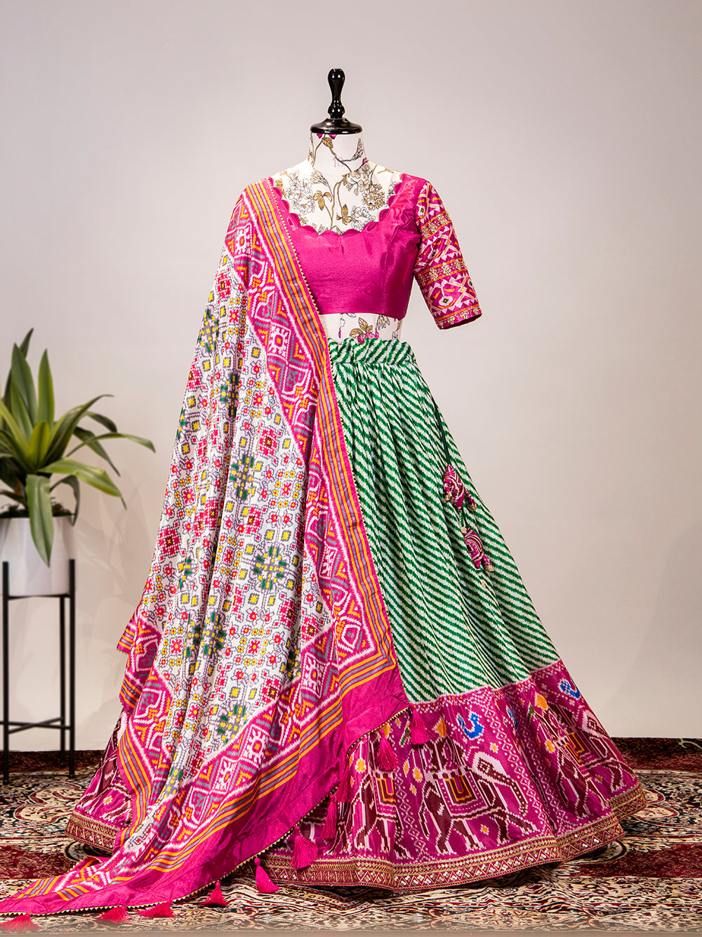 Green Color Leheriya Patola Print Chinon Lehenga Choli Clothsvilla