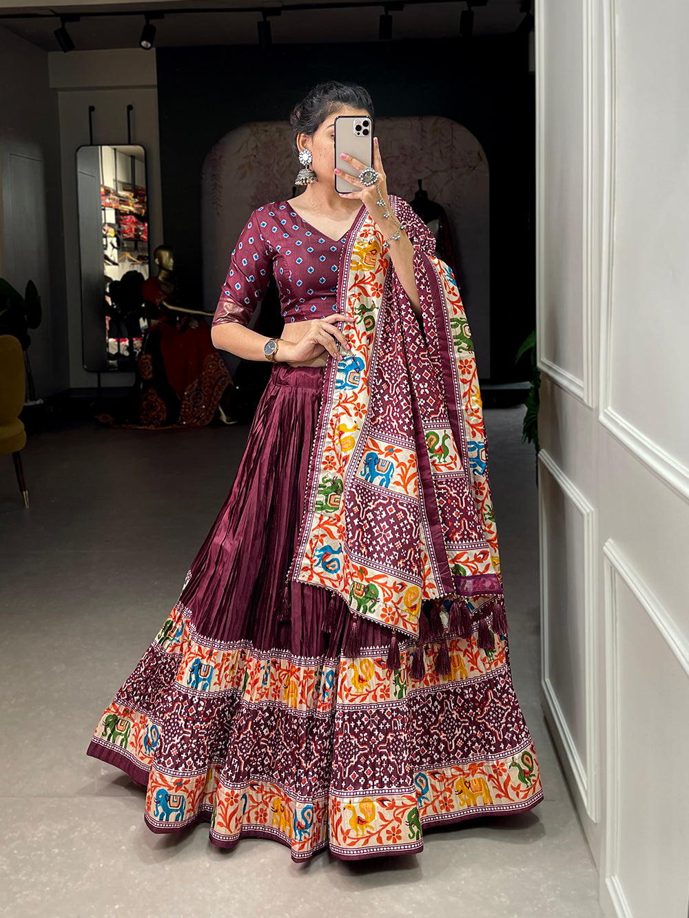 Maroon Color Bandhej Print With Patola Print Crushed Dola Silk Lehenga Choli ClothsVilla.com