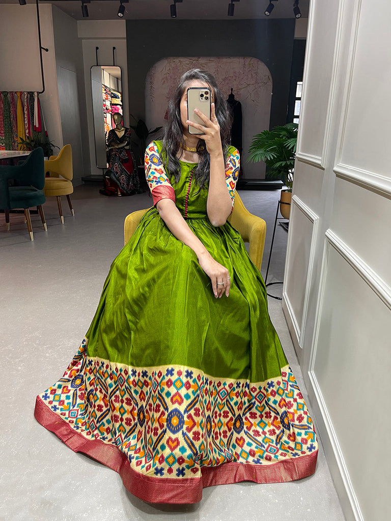 Mehendi Color Foil Printed Dola Silk Gown Clothsvilla