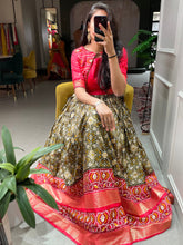 Load image into Gallery viewer, Mehndi Color Patola Printed And Foil Printed Dola Silk Gown Clothsvilla