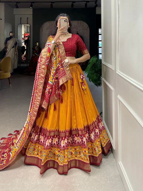 Mustard Color Patola Print With Foil Work Tussar Silk Lehenga Choli ClothsVilla Main image