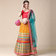 Load image into Gallery viewer, Mustard Partywear Embroidered &amp; Mirror Work Heavy Soft Net Lehenga Clothsvilla