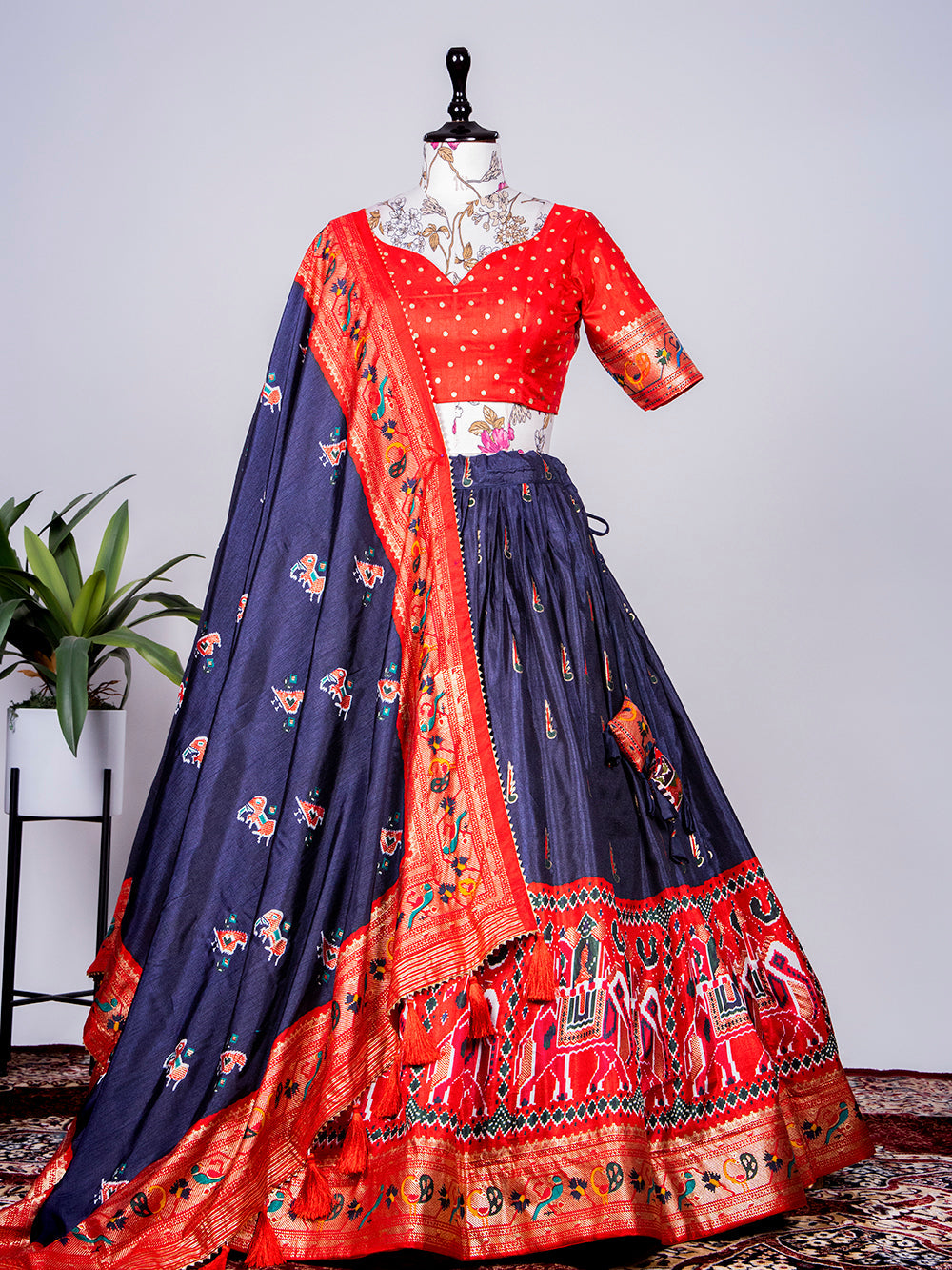 Navy Blue Color Haydrabadi Patola Printed & Foil Work Dola Silk Lehenga Clothsvilla