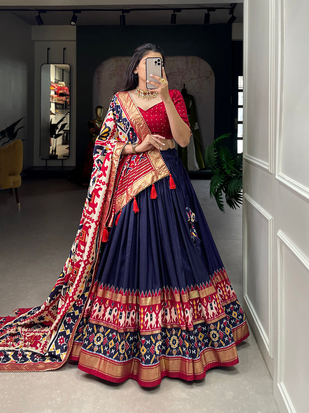 Navy Blue Color Ikkat Patola Print With Foil Work Tussar Silk Lehenga Choli ClothsVilla