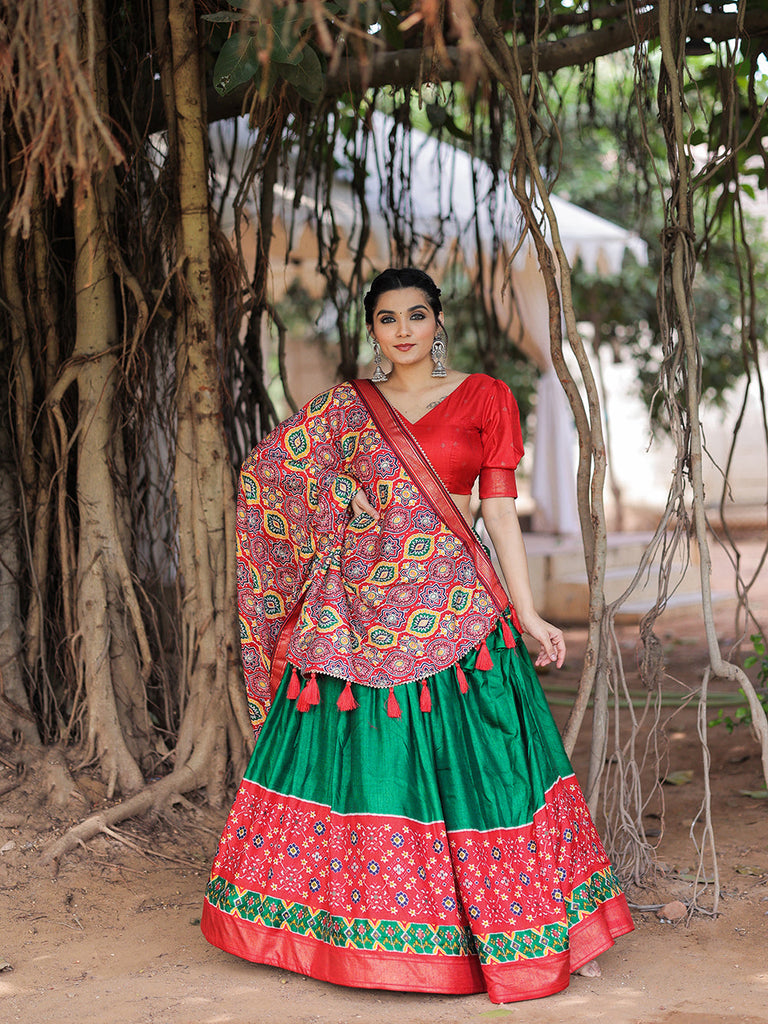 Photo of green apply colored blouse with gold lehenga skirt and red dupatta