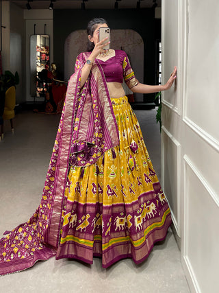 Mustard Color Patola Printed With Foil Work Tussar Silk Lehenga Choli ClothsVilla