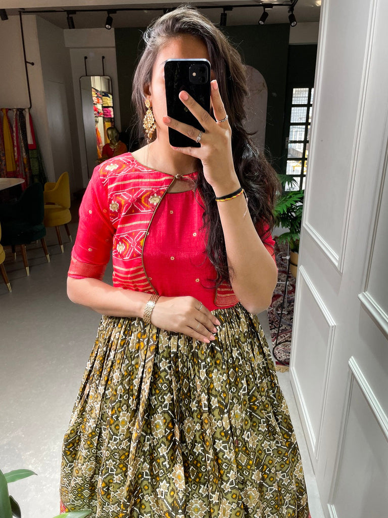 Mehndi Color Patola Printed And Foil Printed Dola Silk Gown Clothsvilla