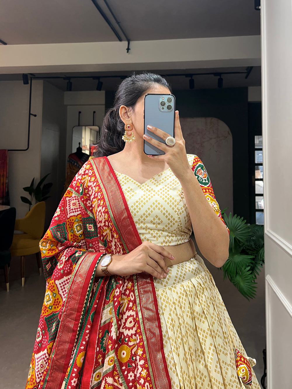 Off White Color Bandhej And Patola Print With Foil Work Tussar Silk Lehnga Choli Clothsvilla
