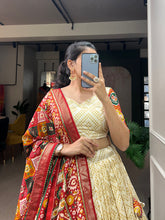 Load image into Gallery viewer, Off White Color Bandhej And Patola Print With Foil Work Tussar Silk Lehnga Choli Clothsvilla