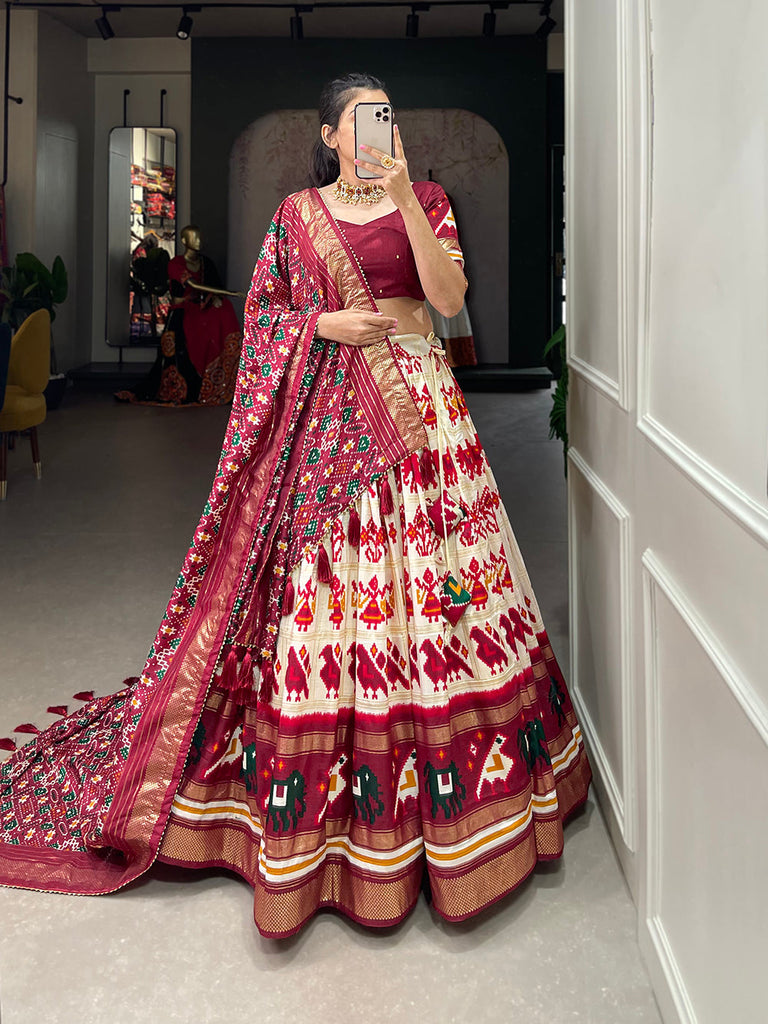 Off White Color Patola Printed With Foil Work Tussar Silk Lehenga Choli ClothsVilla