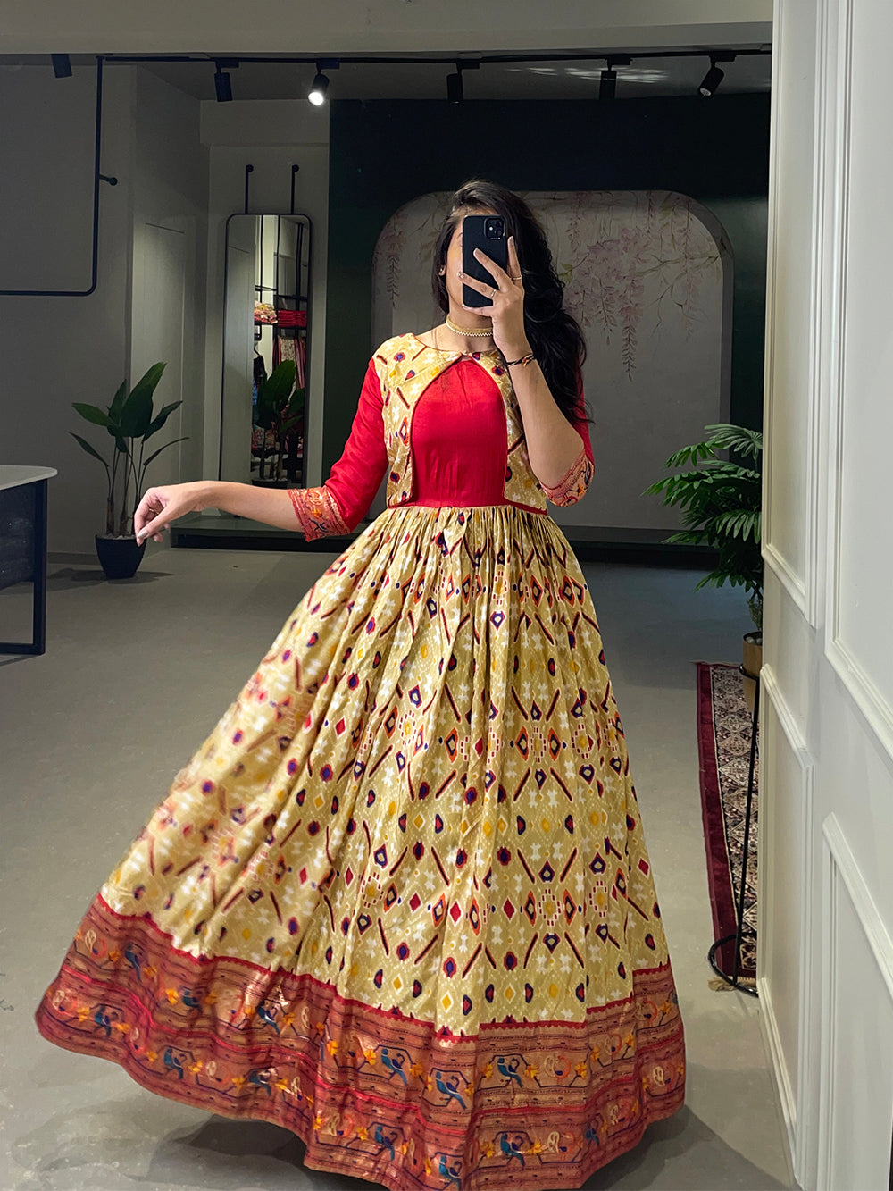 Off White Color Patola Paithani Printed And Foil Printed Silk Gown Clothsvilla