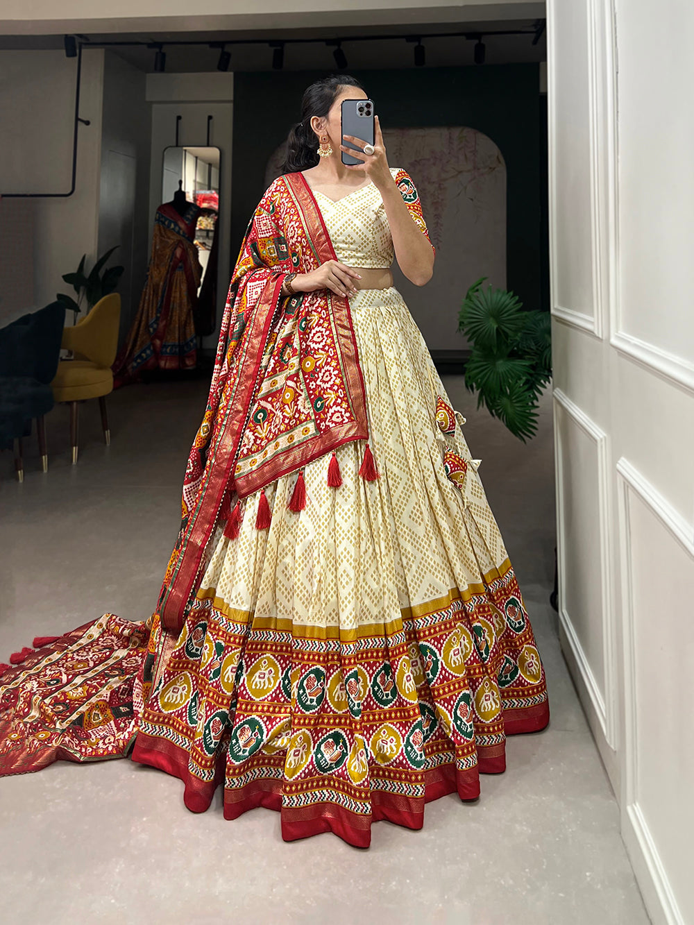 Off White Color Bandhej And Patola Print With Foil Work Tussar Silk Lehnga Choli Clothsvilla