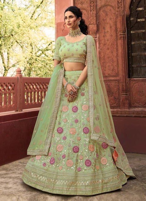 Organza Stone And Dori Work Lehenga Choli in Pista Green Clothsvilla Main image