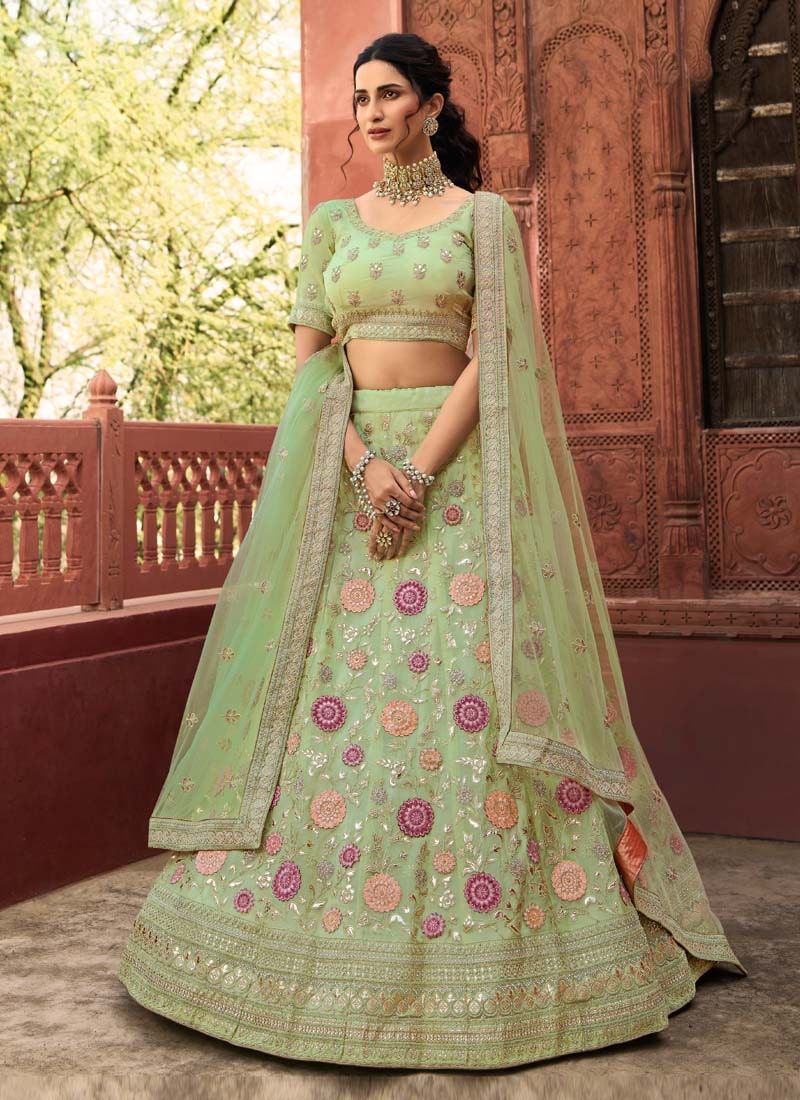 Organza Stone And Dori Work Lehenga Choli in Pista Green Clothsvilla Main image