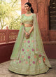 Load image into Gallery viewer, Organza Stone And Dori Work Lehenga Choli in Pista Green Clothsvilla