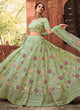 Load image into Gallery viewer, Organza Stone And Dori Work Lehenga Choli in Pista Green Clothsvilla