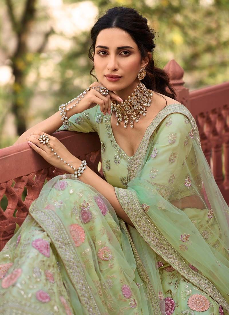 Organza Stone And Dori Work Lehenga Choli in Pista Green Clothsvilla