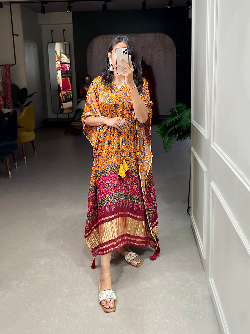 Mustard Color Patola Printed Gaji Silk Kaftan ClothsVilla.com