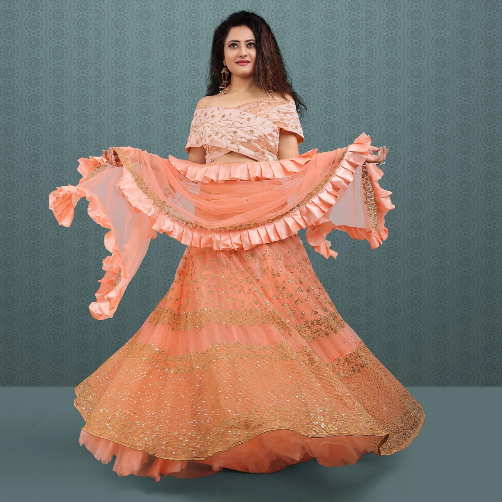 Peach Party Wear Sequins Embroidered Net Lehenga Choli Clothsvilla