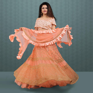 Peach Party Wear Sequins Embroidered Net Lehenga Choli Clothsvilla