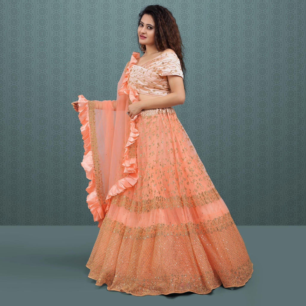 Peach frilled edge net lehenga choli best sale