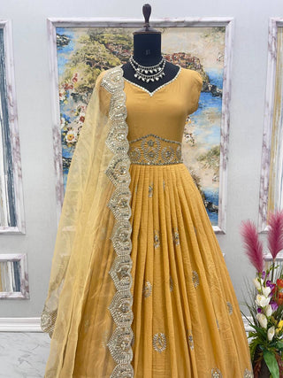 Captivating  Mustard Color Sequence Work Silk Gown Clothsvilla