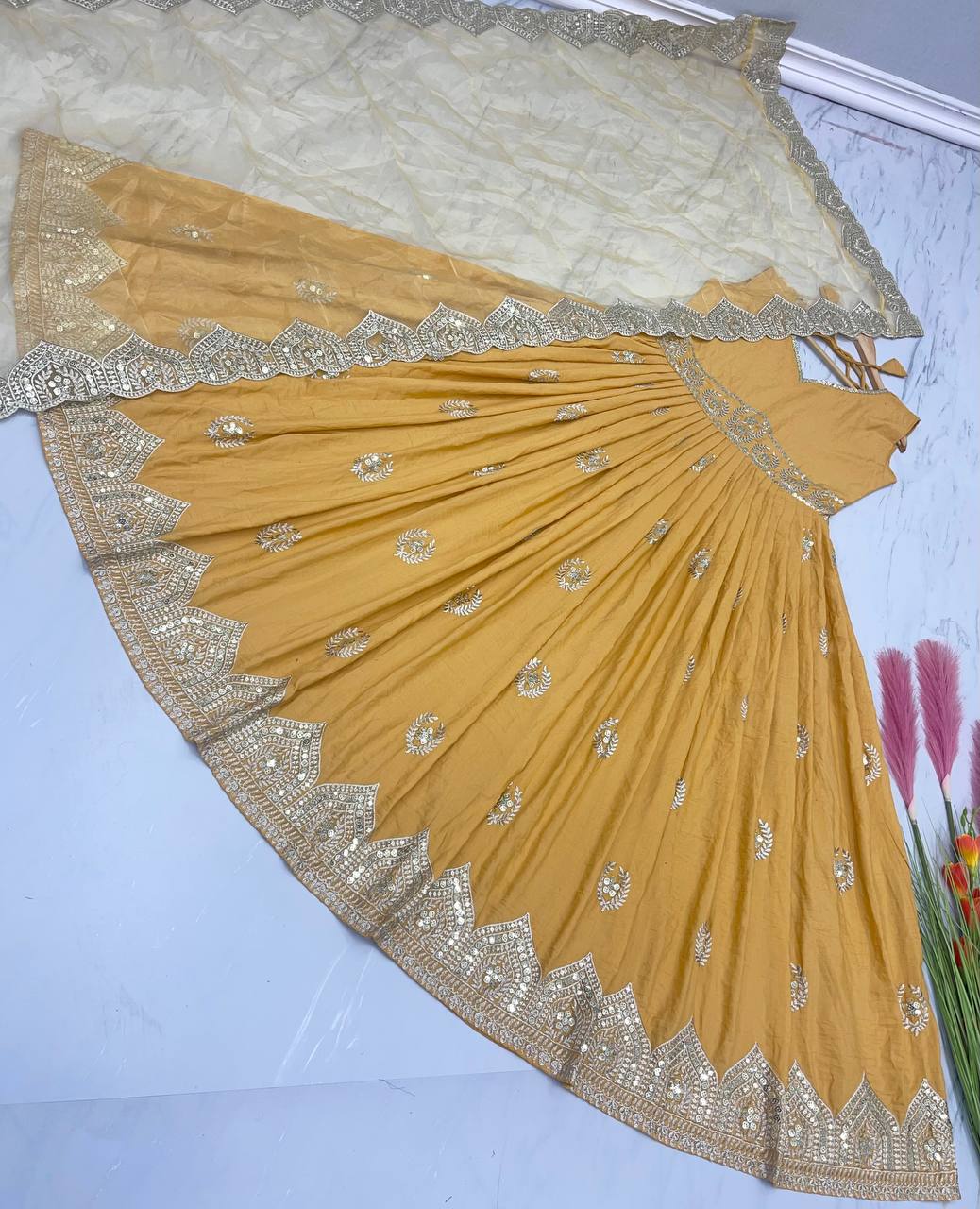 Captivating  Mustard Color Sequence Work Silk Gown Clothsvilla