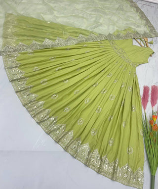 Glimmering  Light Green Color Sequence Work Silk Gown Clothsvilla