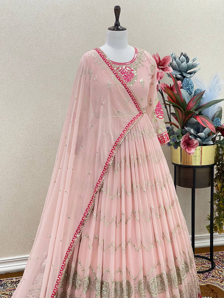 Mesmerizing Sequence Work Peach Color Gown Clothsvilla