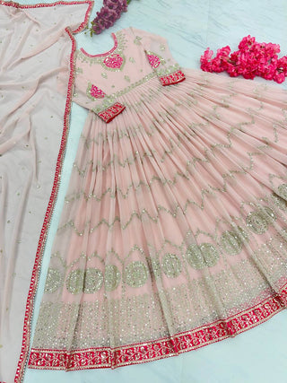 Mesmerizing Sequence Work Peach Color Gown Clothsvilla