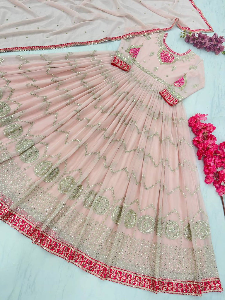 Mesmerizing Sequence Work Peach Color Gown Clothsvilla