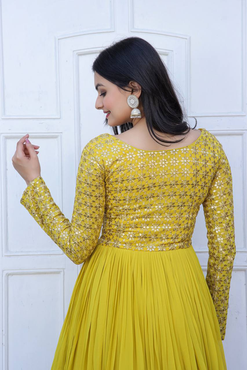 Beautiful Neck pattern Yellow Sequence Work Gown Clothsvilla