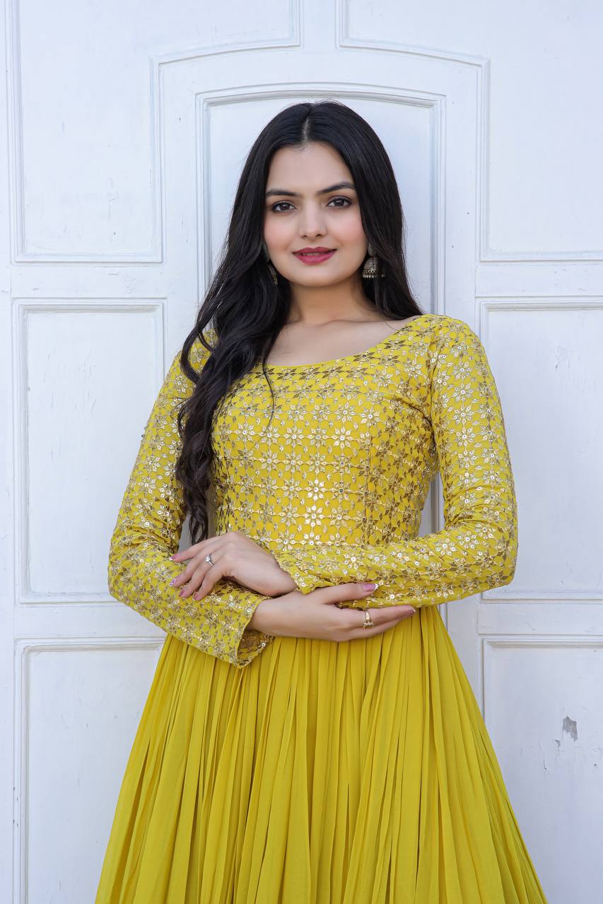 Beautiful Neck pattern Yellow Sequence Work Gown Clothsvilla