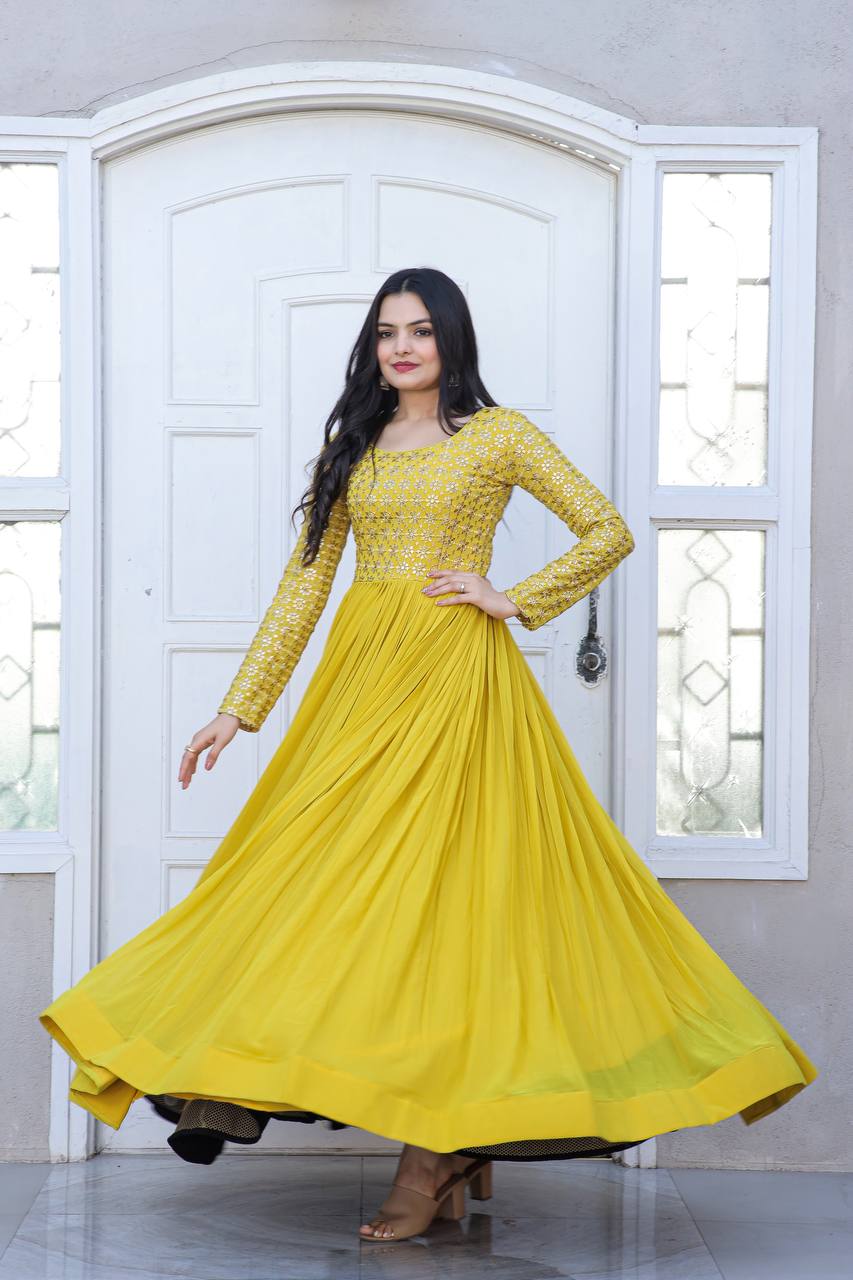 Beautiful Neck pattern Yellow Sequence Work Gown Clothsvilla