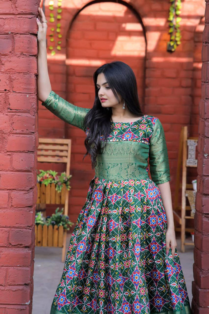 Beautiful Patola Print Green Color Gown