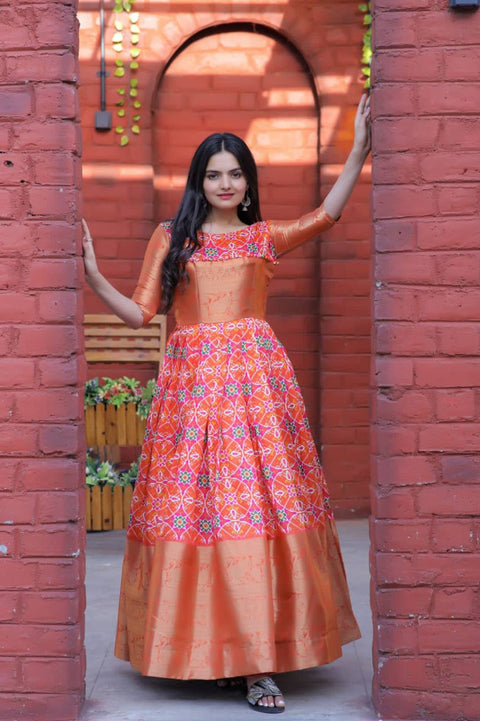 Beautiful Patola Print Orange Color Gown Main image