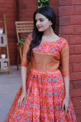 Beautiful Patola Print Orange Color Gown