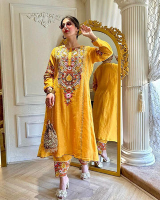 Glamourous Embroidery Work Mustard Color Gown With Pant