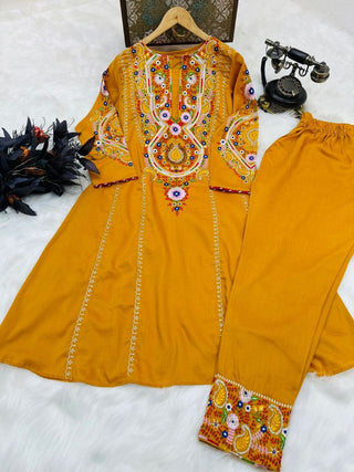 Glamourous Embroidery Work Mustard Color Gown With Pant