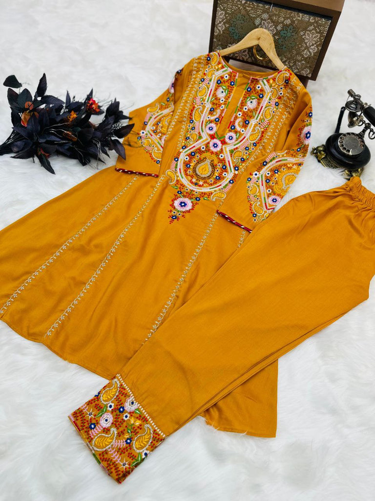 Glamourous Embroidery Work Mustard Color Gown With Pant