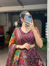 Load image into Gallery viewer, Wine Color Bandhej And Patola Print With Foil Work Tussar Silk Lehnga Choli Clothsvilla