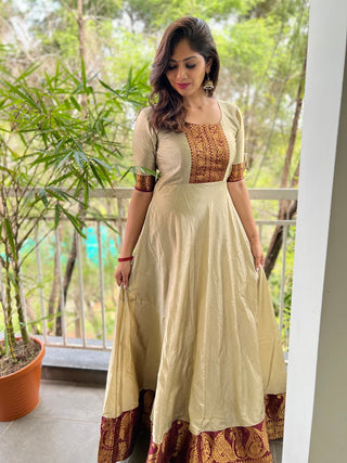 Chiku Color Weaving Zari Work Silk Gown Clothsvilla