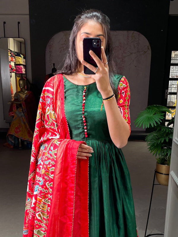 Green Color Patola And Foil Printed Dola Silk Gown Clothsvilla