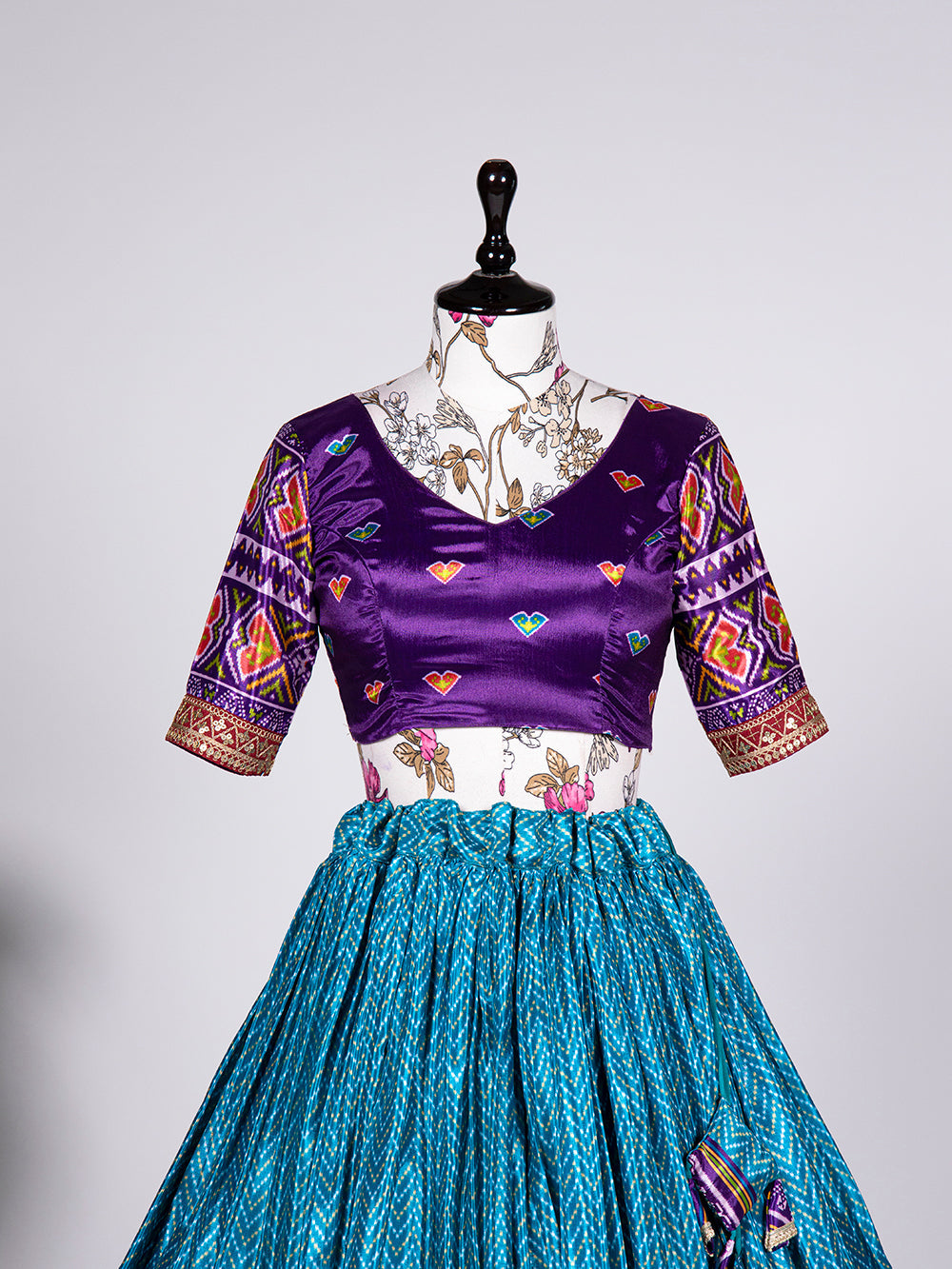 Firozi Color Laheriya Patola Print and Sequins Embroidery Chinon Lehenga Choli ClothsVilla