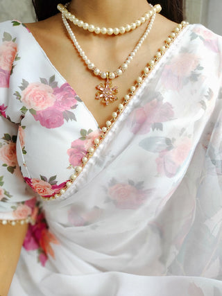 White Color Printed With Pearl Lace Border Georgette Saree Clothsvilla