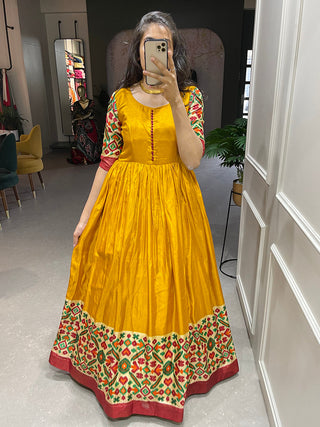 Yellow Color Foil Printed Dola Silk Gown Clothsvilla