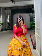 Load image into Gallery viewer, Yellow Color Patola Printed And Foil Printed Dola Silk Gown Clothsvilla